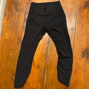 Lululemon leggings, Black with black mesh on bottom of leg, size 8. EUC